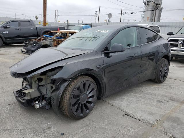 TESLA MODEL Y 2023 with VIN 7SAYGDEF3PF703089 - Photo from auction