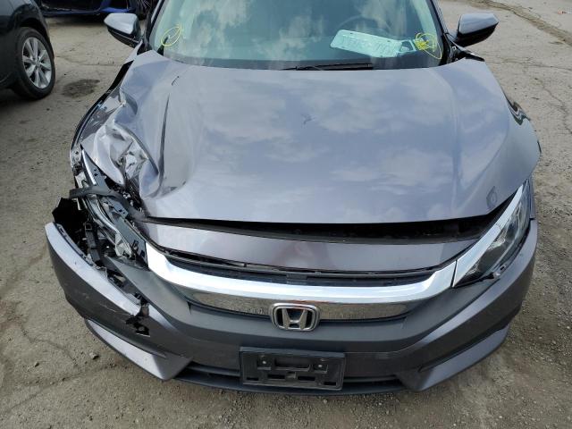 Photo 11 from auction – 2016 HONDA CIVIC LX with VIN 19XFC2F56GE219496