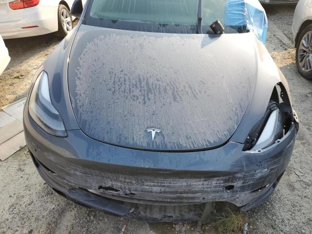Photo 11 from auction – 2022 TESLA MODEL Y with VIN 7SAYGDEF1NF406092