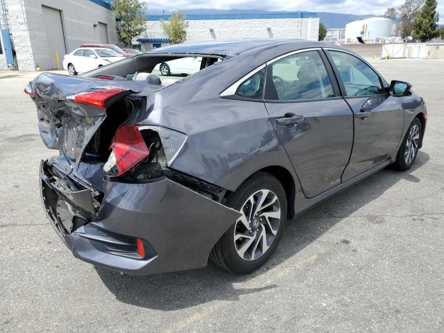 Photo 3 from auction – 2016 HONDA CIVIC EX with VIN 2HGFC2F76GH518350