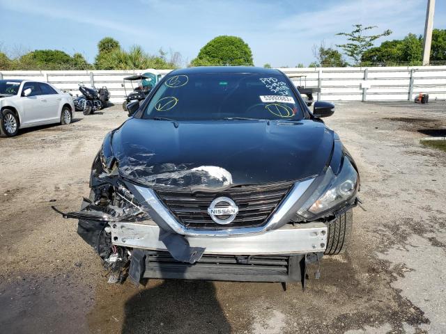 Photo 5 from auction – 2016 NISSAN ALTIMA 2.5 with VIN 1N4AL3AP1GC209691
