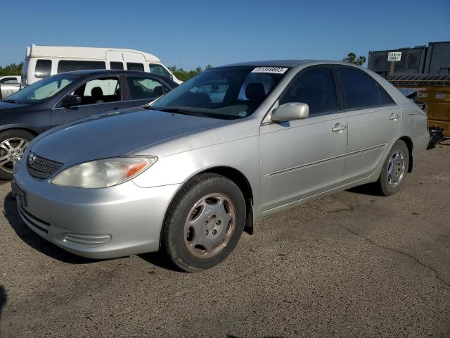 TOYOTA CAMRY LE 2002 with VIN 4T1BF30KX2U001772 - Photo from auction