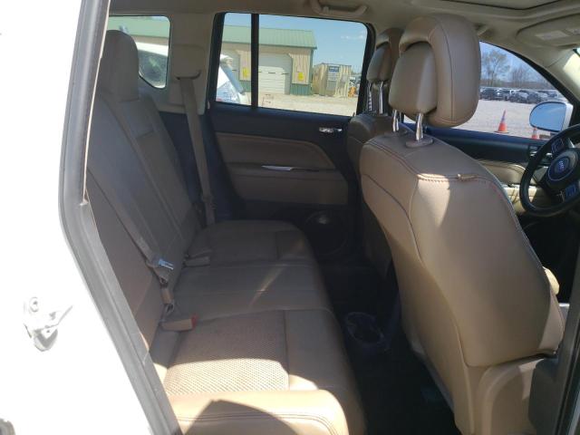Photo 11 from auction – 2014 JEEP COMPASS LA with VIN 1C4NJCEBXED522505