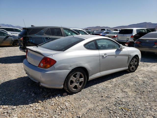 Photo 4 from auction – 2003 HYUNDAI TIBURON with VIN KMHHM65D83U102161