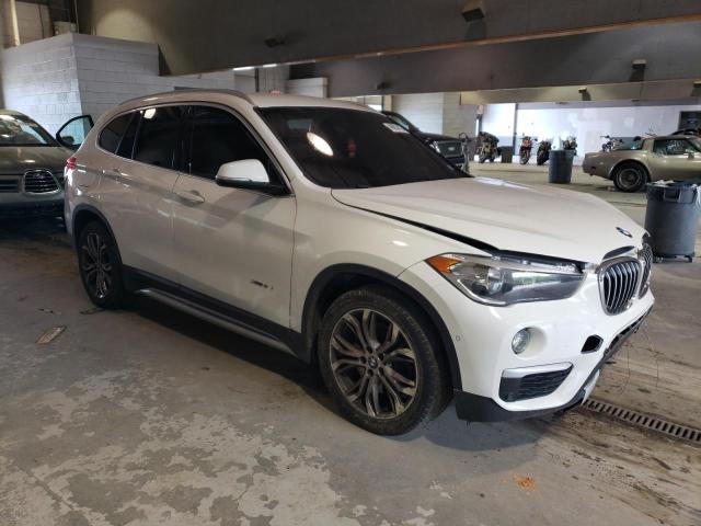 Photo 4 from auction – 2016 BMW X1 XDRIVE2 with VIN WBXHT3C31G5E54066