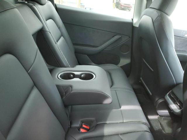 Photo 11 from auction – 2023 TESLA MODEL Y with VIN 7SAYGAEE9PF697966