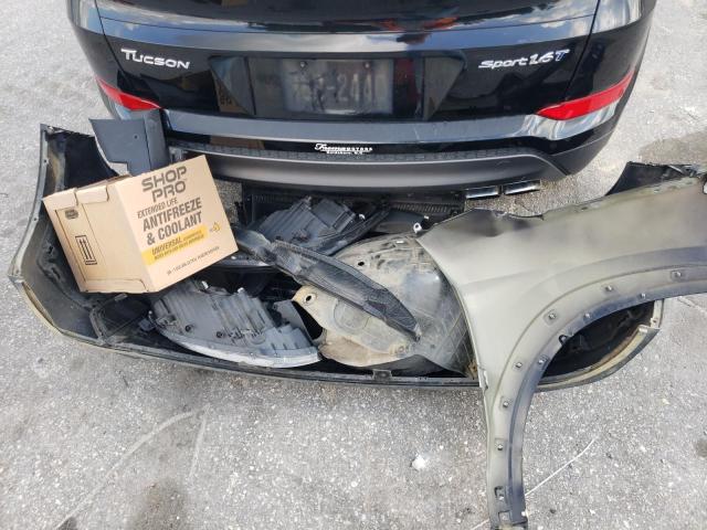 Photo 13 from auction – 2016 HYUNDAI TUCSON LIM with VIN KM8J33A27GU139876