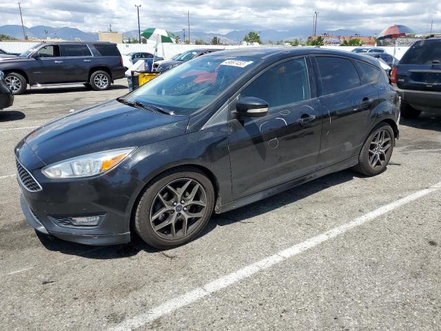 FORD FOCUS SE 2015 with VIN 1FADP3K2XFL385917 - Photo from auction
