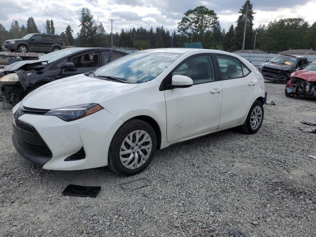 TOYOTA COROLLA L 2018 with VIN 5YFBURHE9JP743314 - Photo from auction