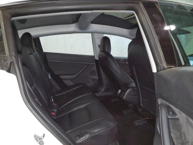 Photo 10 from auction – 2021 TESLA MODEL 3 with VIN 5YJ3E1EB2MF055913