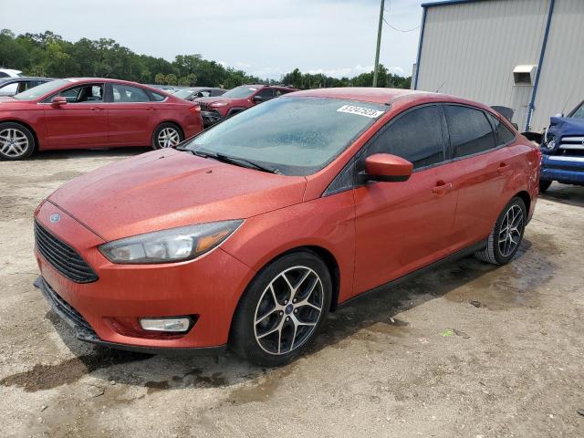 FORD FOCUS SE 2018 with VIN 1FADP3FE9JL275468 - Photo from auction