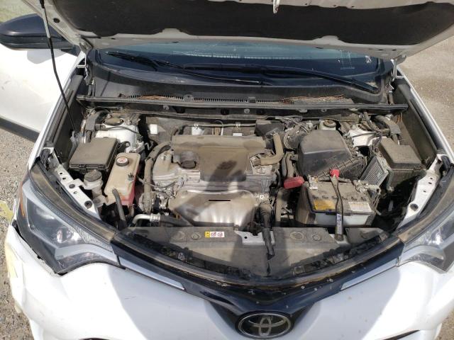 Photo 11 from auction – 2018 TOYOTA RAV4 LE with VIN JTMZFREV2JD129446