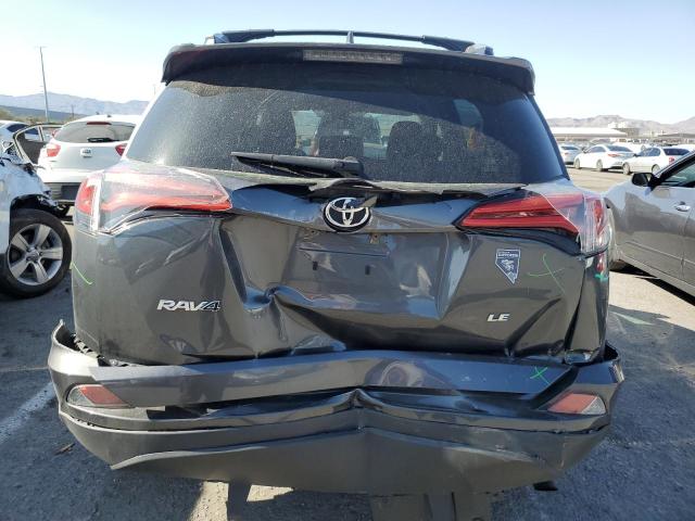 Photo 6 from auction – 2018 TOYOTA RAV4 LE with VIN 2T3ZFREV0JW458603