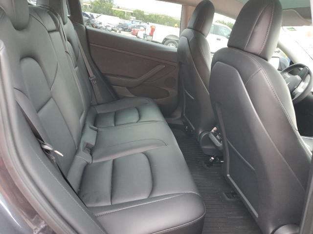 Photo 11 from auction – 2022 TESLA MODEL 3 with VIN 5YJ3E1EC9NF318053