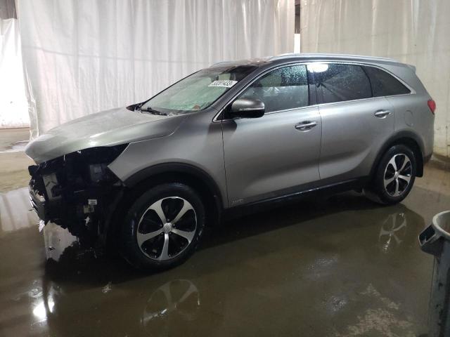 KIA SORENTO EX 2016 with VIN 5XYPHDA15GG007178 - Photo from auction