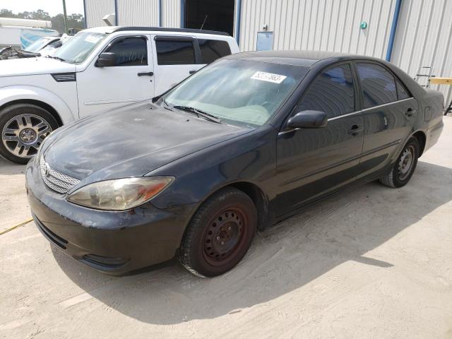 TOYOTA CAMRY LE 2002 with VIN JTDBE32K420012990 - Photo from auction