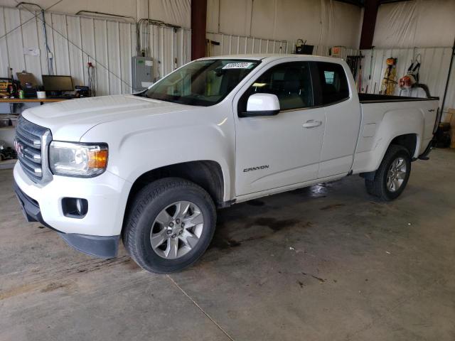 GMC CANYON SLE 2015 with VIN 1GTH6BEA7F1155663 - Photo from auction