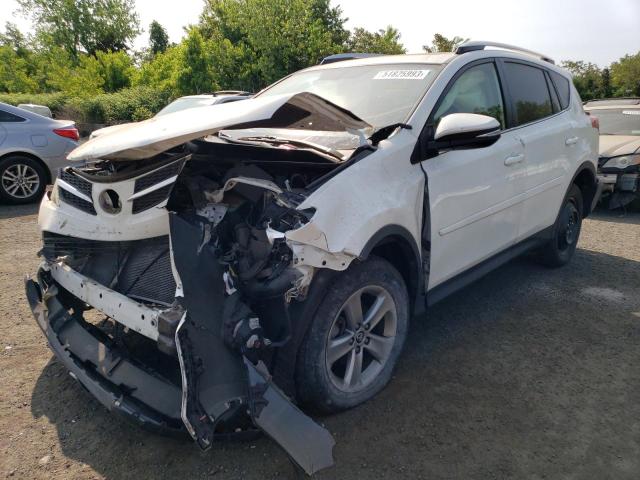 TOYOTA RAV4 XLE 2015 with VIN JTMRFREV7FJ045809 - Photo from auction