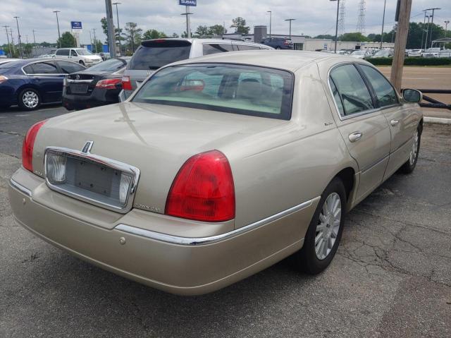 Photo 4 from auction – 2004 LINCOLN TOWN CAR E with VIN 1LNHM81W54Y651149