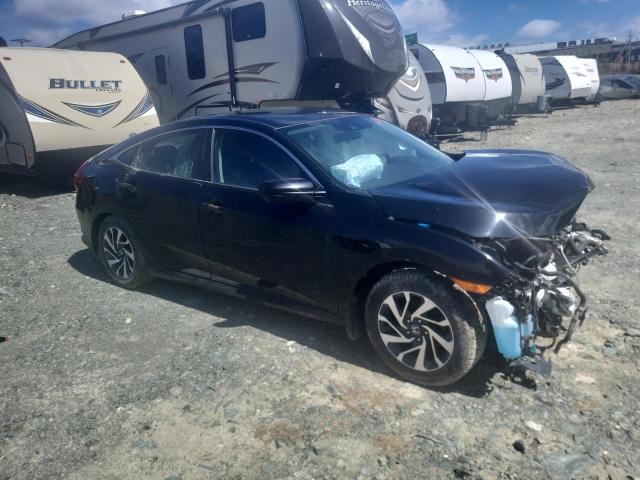 Photo 4 from auction – 2018 HONDA CIVIC LX with VIN 2HGFC2F67JH010628