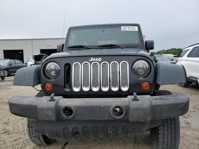 Photo 5 from auction – 2013 JEEP WRANGLER U with VIN 1C4BJWDG9DL520539