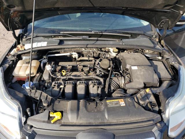 Photo 11 from auction – 2014 FORD FOCUS SE with VIN 1FADP3F26EL217314