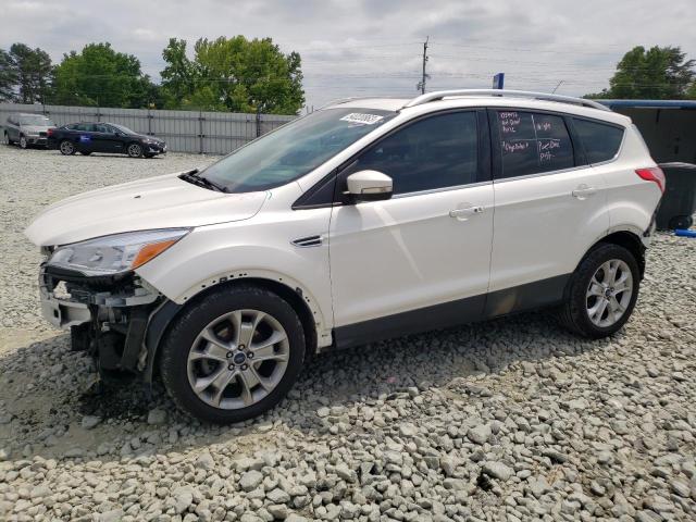 FORD ESCAPE TIT 2016 with VIN 1FMCU0JX3GUA17371 - Photo from auction