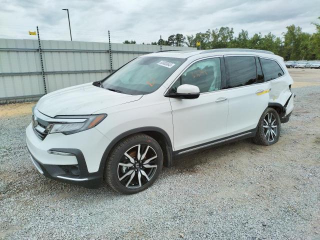 HONDA PILOT TOUR 2022 with VIN 5FNYF6H61NB002135 - Photo from auction
