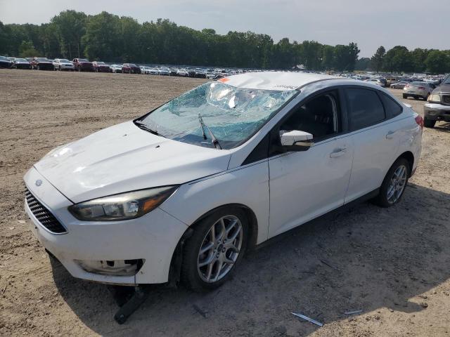 FORD FOCUS SE 2015 with VIN 1FADP3F21FL235107 - Photo from auction