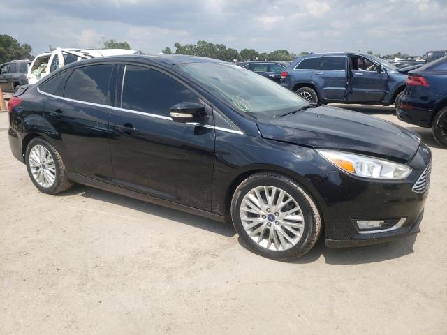 Photo 4 from auction – 2018 FORD FOCUS TITA with VIN 1FADP3J26JL281144