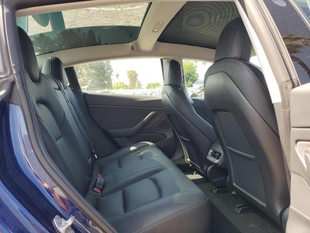 Photo 10 from auction – 2018 TESLA MODEL 3 with VIN 5YJ3E1EA1JF102612