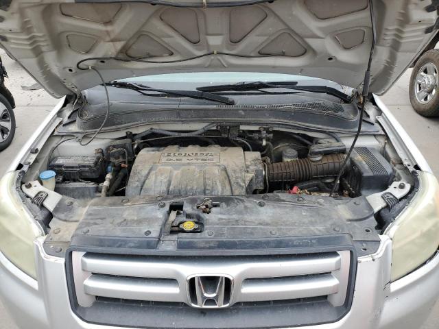 Photo 12 from auction – 2006 HONDA PILOT with VIN 2HKYF18506H541598