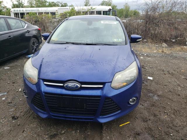 Photo 5 from auction – 2012 FORD FOCUS TITA with VIN 1FAHP3J2XCL297674
