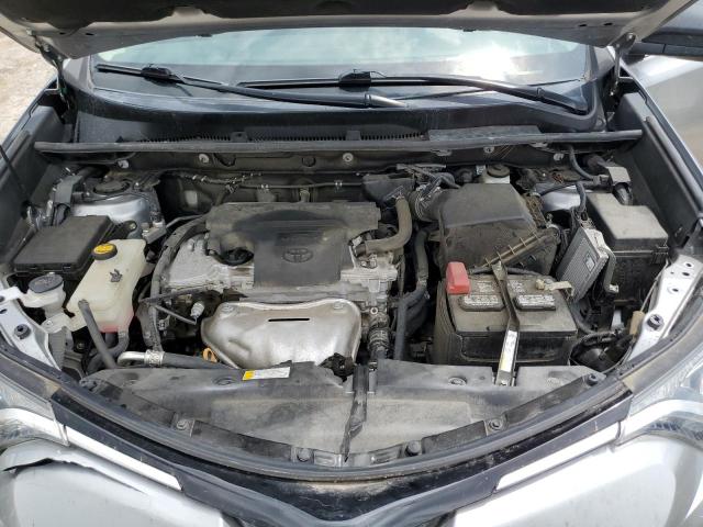 Photo 11 from auction – 2018 TOYOTA RAV4 LE with VIN 2T3BFREV7JW724491