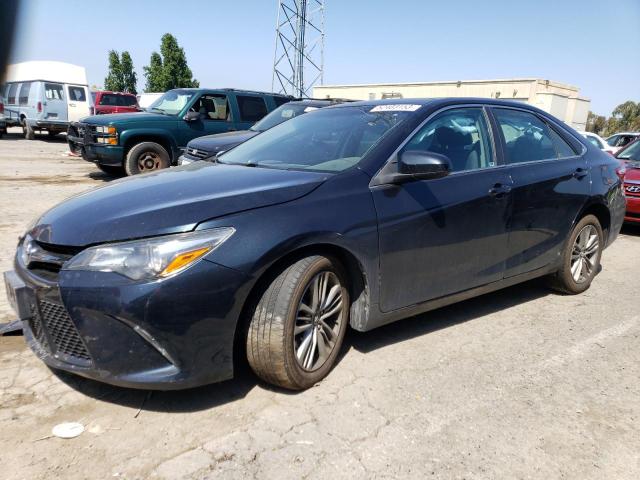 TOYOTA CAMRY LE 2016 with VIN 4T1BF1FK8GU204386 - Photo from auction