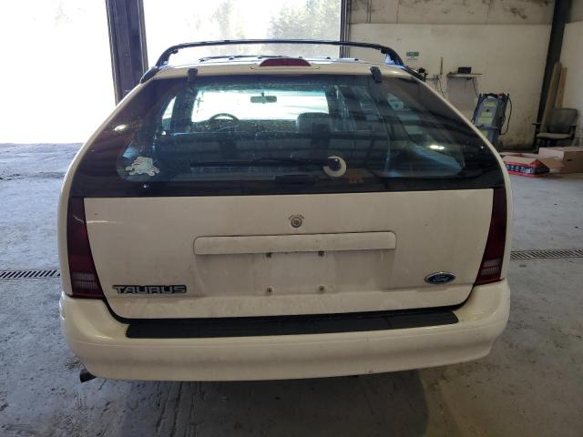 Photo 6 from auction – 1994 FORD TAURUS GL with VIN 1FALP5747RG138336