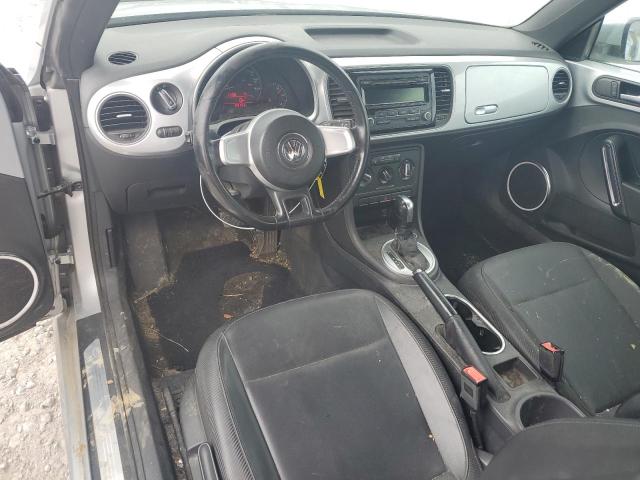Photo 8 from auction – 2012 VOLKSWAGEN BEETLE with VIN 3VWJX7AT1CM612630