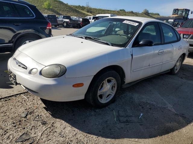 FORD TAURUS 1999 with VIN 1FAFP53U4XG125494 - Photo from auction