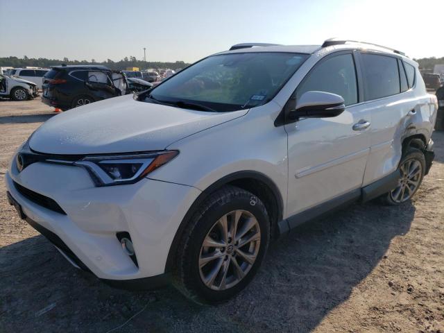 TOYOTA RAV4 LIMIT 2016 with VIN JTMYFREV4GJ085469 - Photo from auction