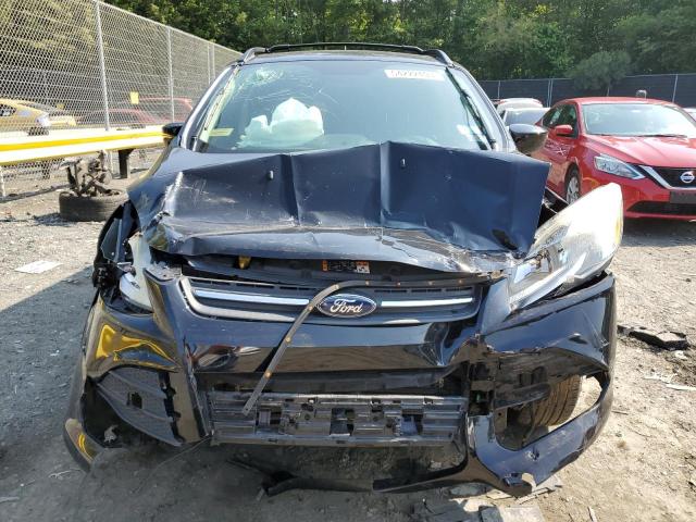 Photo 5 from auction – 2016 FORD ESCAPE SE with VIN 1FMCU0GX1GUC52245