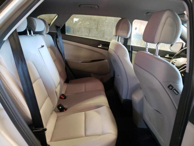 Photo 11 from auction – 2018 HYUNDAI TUCSON SE with VIN KM8J2CA4XJU793671