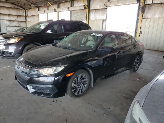 HONDA CIVIC EX 2018 with VIN 19XFC2F77JE031000 - Photo from auction