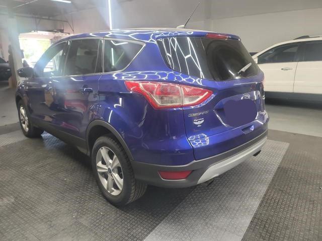 Photo 3 from auction – 2015 FORD ESCAPE SE with VIN 1FMCU9GX0FUA74413