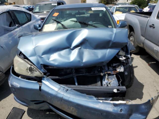 Photo 5 from auction – 2003 TOYOTA CAMRY LE with VIN 4T1BE32K43U739701