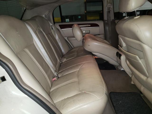 Photo 10 from auction – 2004 LINCOLN TOWN CAR U with VIN 1LNHM83W74Y674008