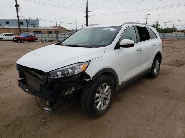 KIA SORENTO LX 2018 with VIN 5XYPGDA5XJG391990 - Photo from auction