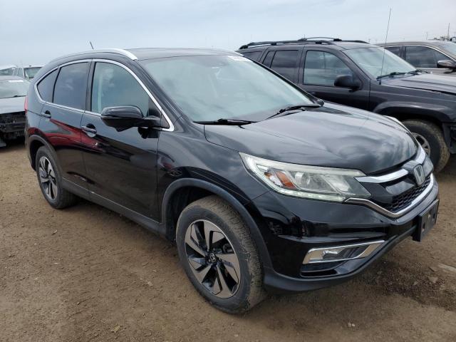 Photo 4 from auction – 2015 HONDA CR-V TOURI with VIN 5J6RM4H94FL045014