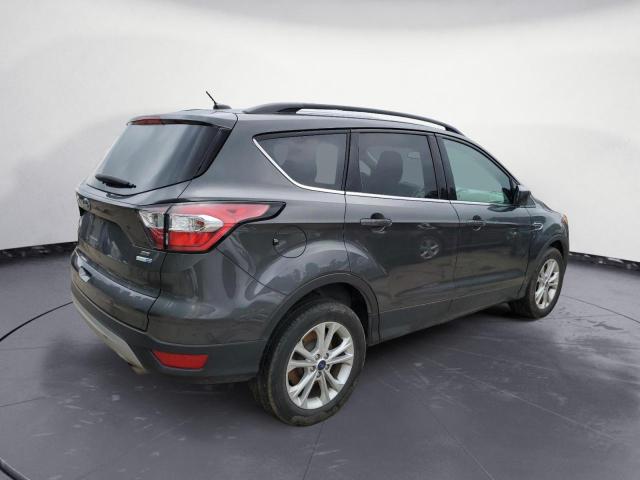 Photo 3 from auction – 2018 FORD ESCAPE SE with VIN 1FMCU9GD8JUD13012