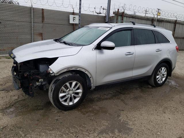 KIA SORENTO LX 2016 with VIN 5XYPG4A35GG096450 - Photo from auction