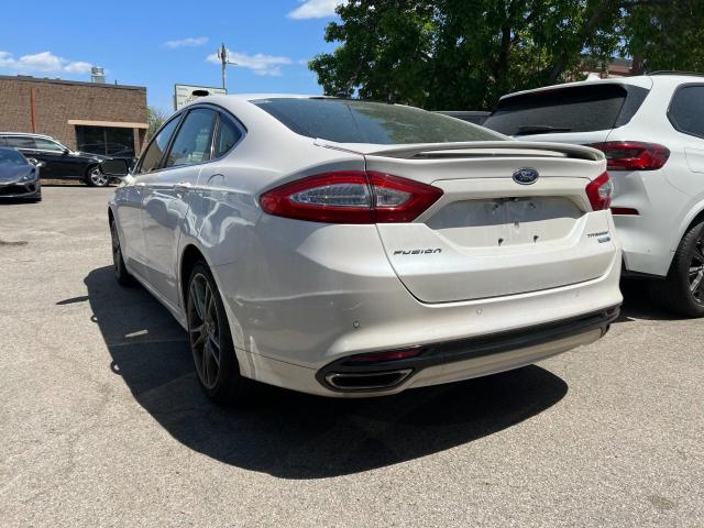 Photo 3 from auction – 2014 FORD FUSION TIT with VIN 3FA6P0D90ER384650